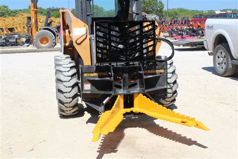 skid steer tree puller rental|skid steer trencher attachment rental.